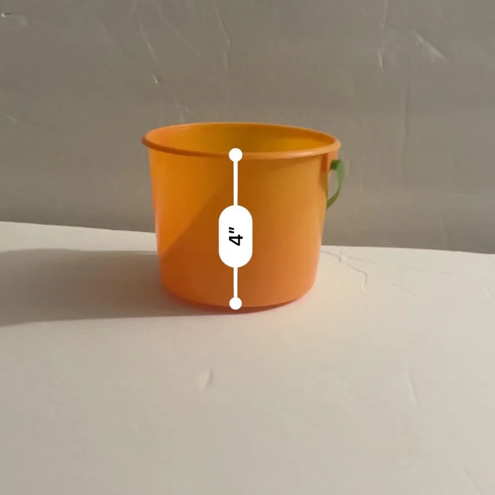 Small Orange Pail with Green Handle
